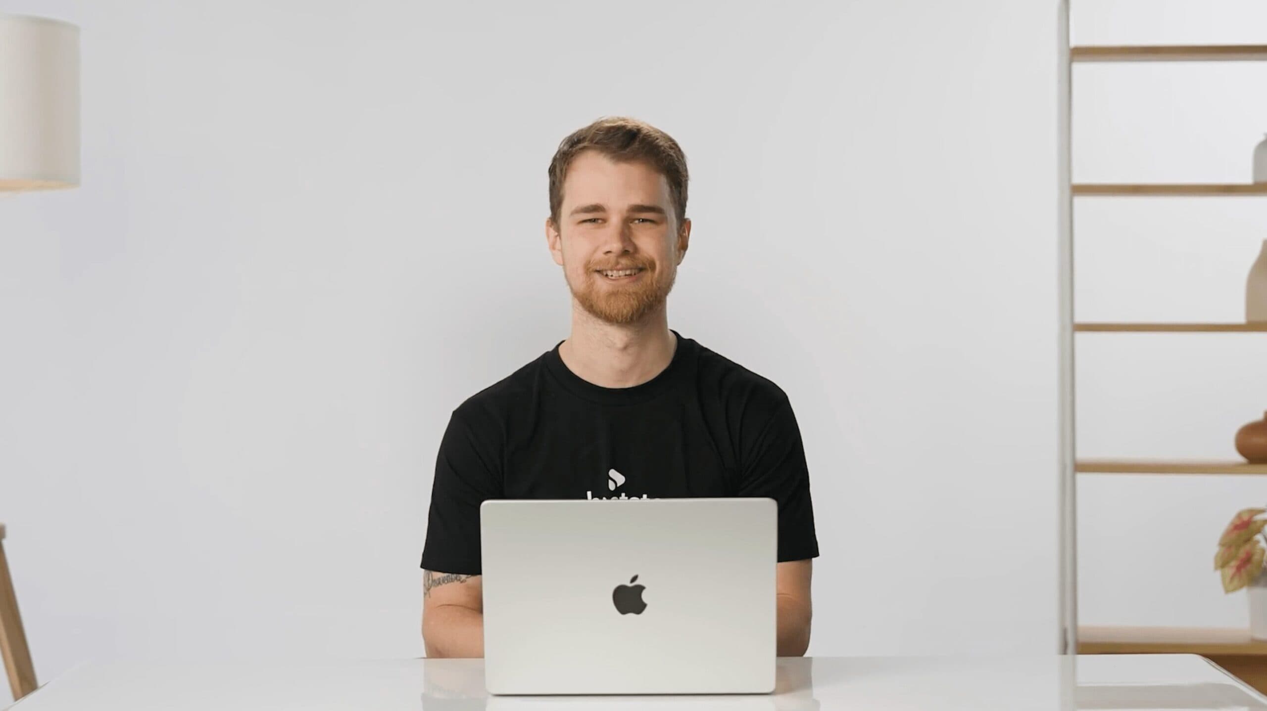 Shootsta team member working on an animation project at a laptop in a studio setting